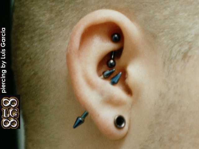 Ear project:rook piercing with a 12ga 3/8" titanium curved barbell, 